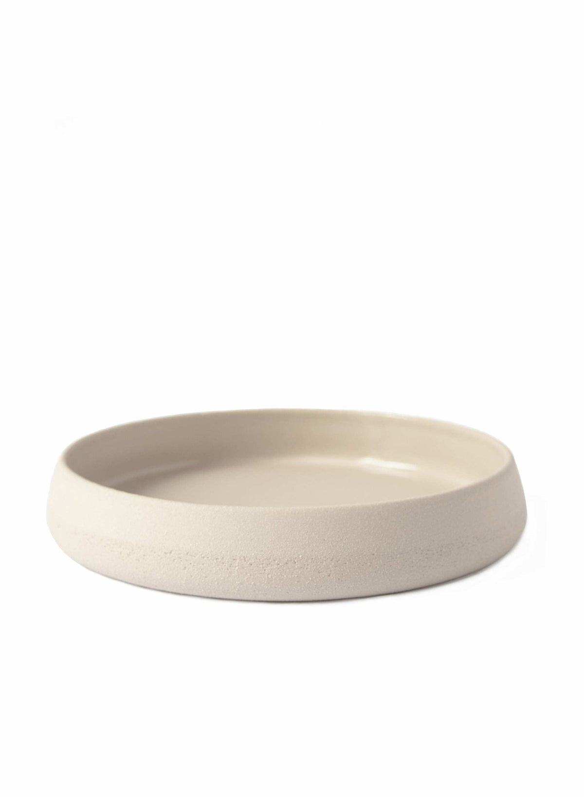 Handmade stoneware dinner plates with high sides and transparent glaze, rustic textured exterior and glossy interior, made in Ukraine