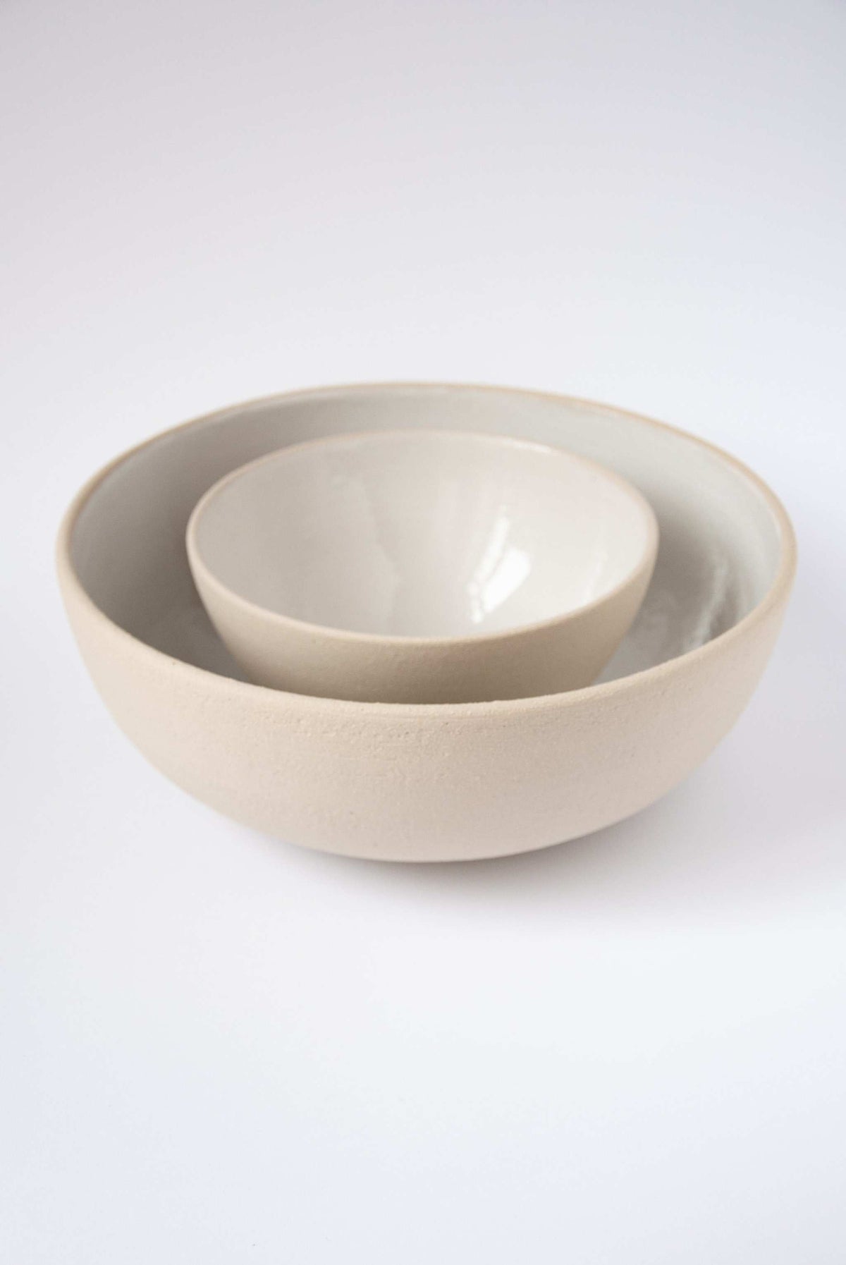 Handmade stoneware large fruit bowl with white glazed interior, dishwasher-safe, crafted in Ukraine