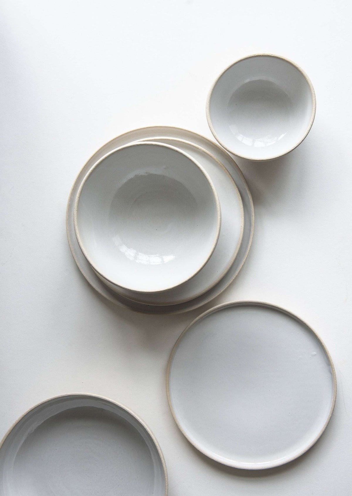 Handmade stoneware soup bowl with white glaze, rough texture, dishwasher and microwave safe, crafted in Ukraine