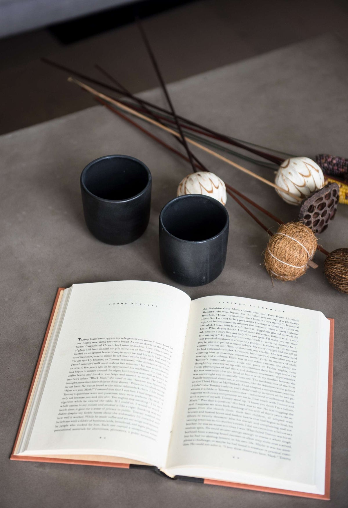 Black matte handmade stoneware cup with organic edges for coffee and tea, 11 oz, dishwasher and microwave safe, made in Ukraine