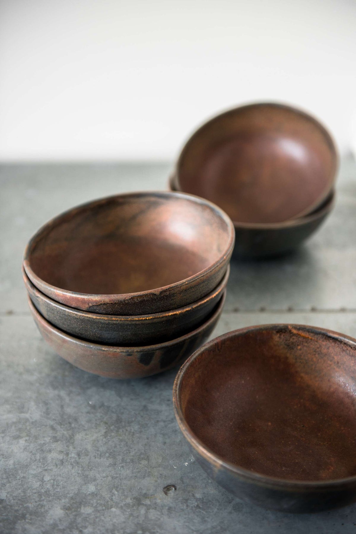 Matte rust stoneware soup bowl with unique reactive glaze swirl, handmade in Ukraine, dishwasher and microwave safe