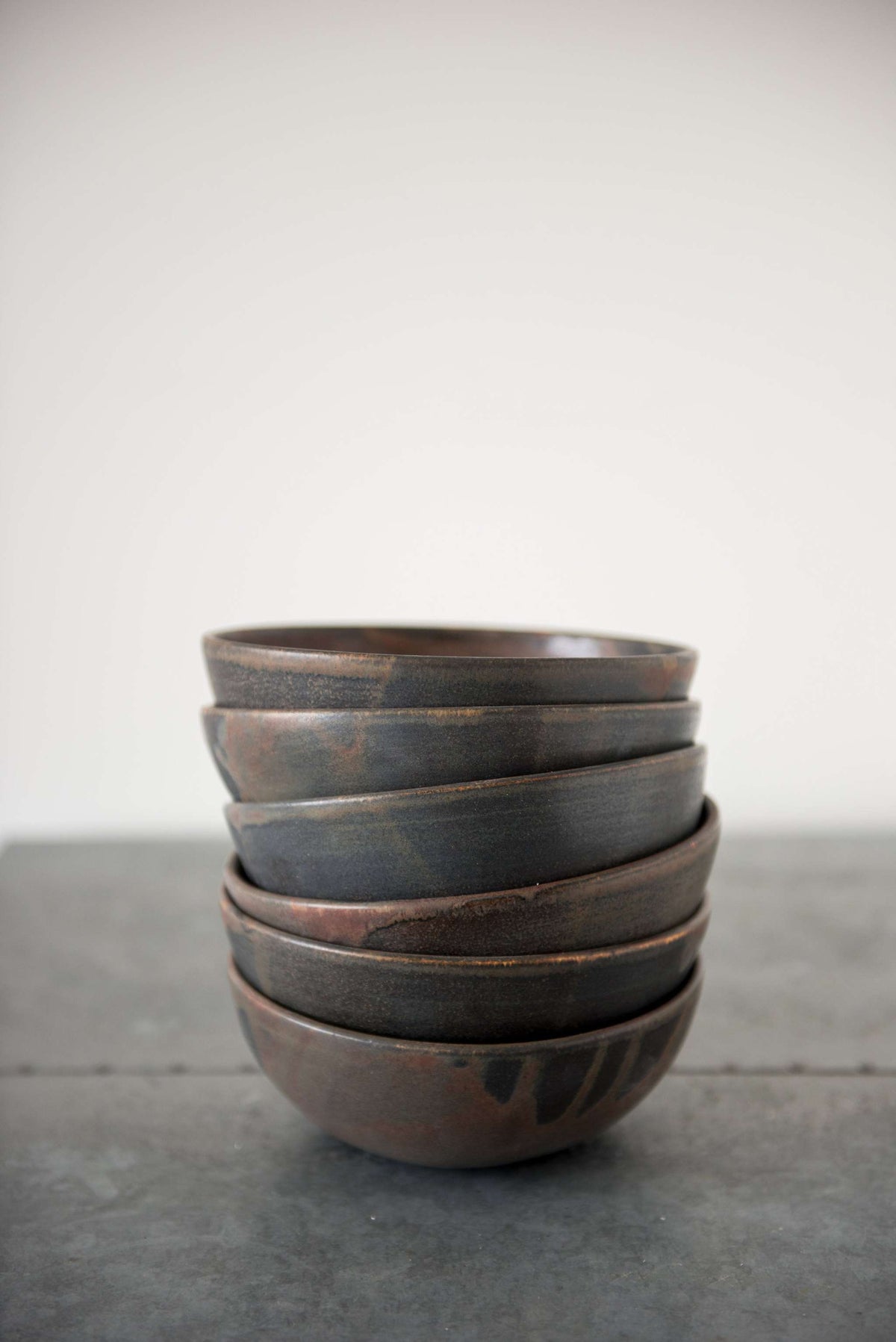 Matte brown-black rust stoneware soup bowl with unique reactive glaze handcrafted in Ukraine