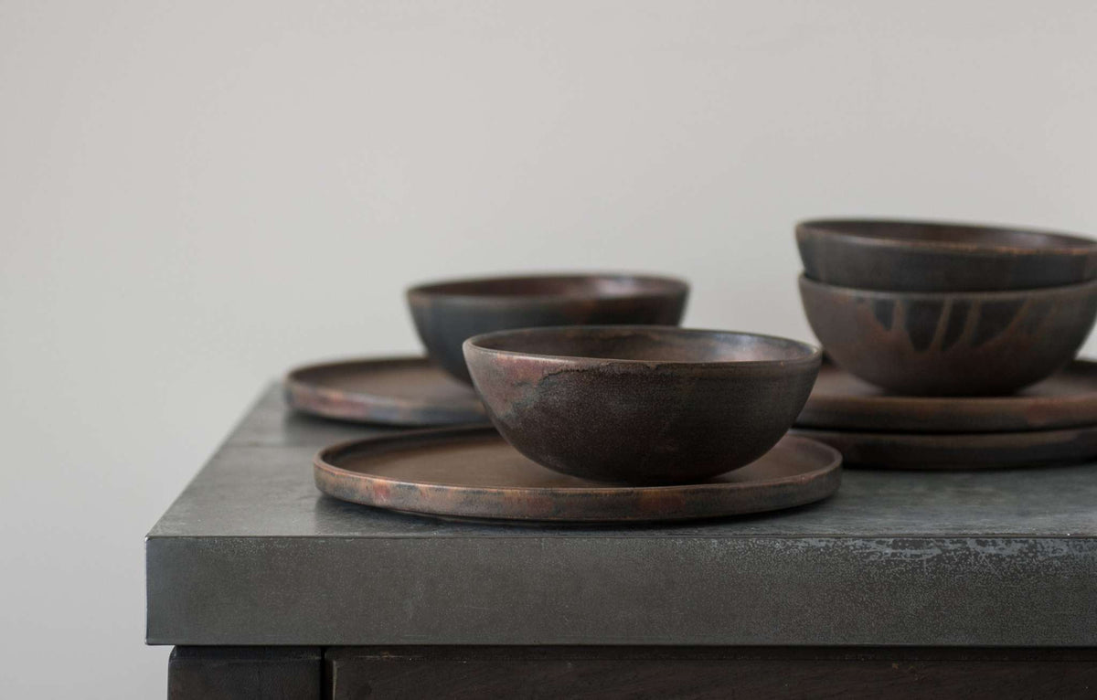 Rust stoneware soup bowl with matte brown-black reactive glaze, handmade in Ukraine