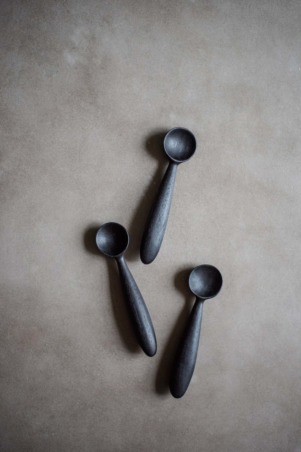 Hand-carved walnut wood spice spoon with food-safe flaxseed oil finish, ideal for spices and sauces, handcrafted in Ukraine