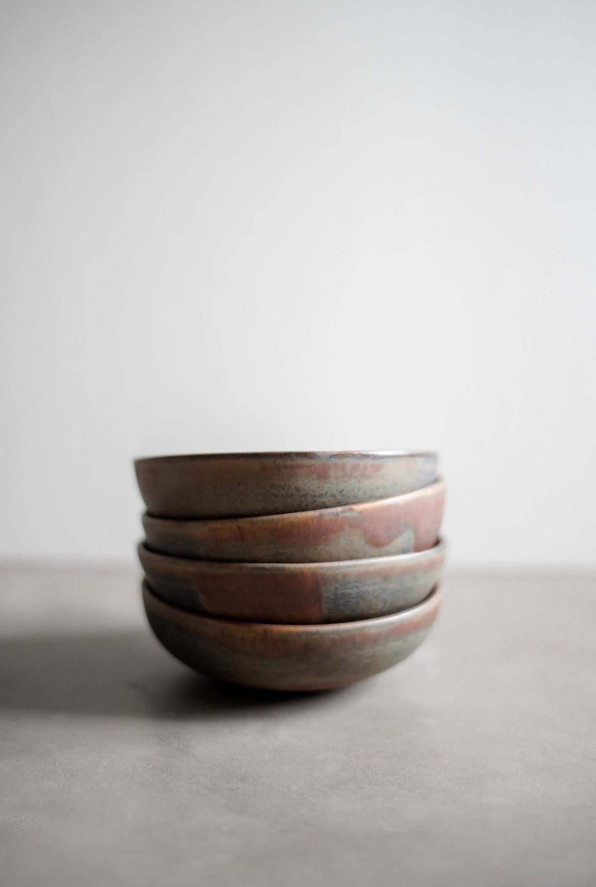 Rust Stoneware Mini Bowl with matte brown-black reactive glaze, handmade in Ukraine, dishwasher and microwave safe.