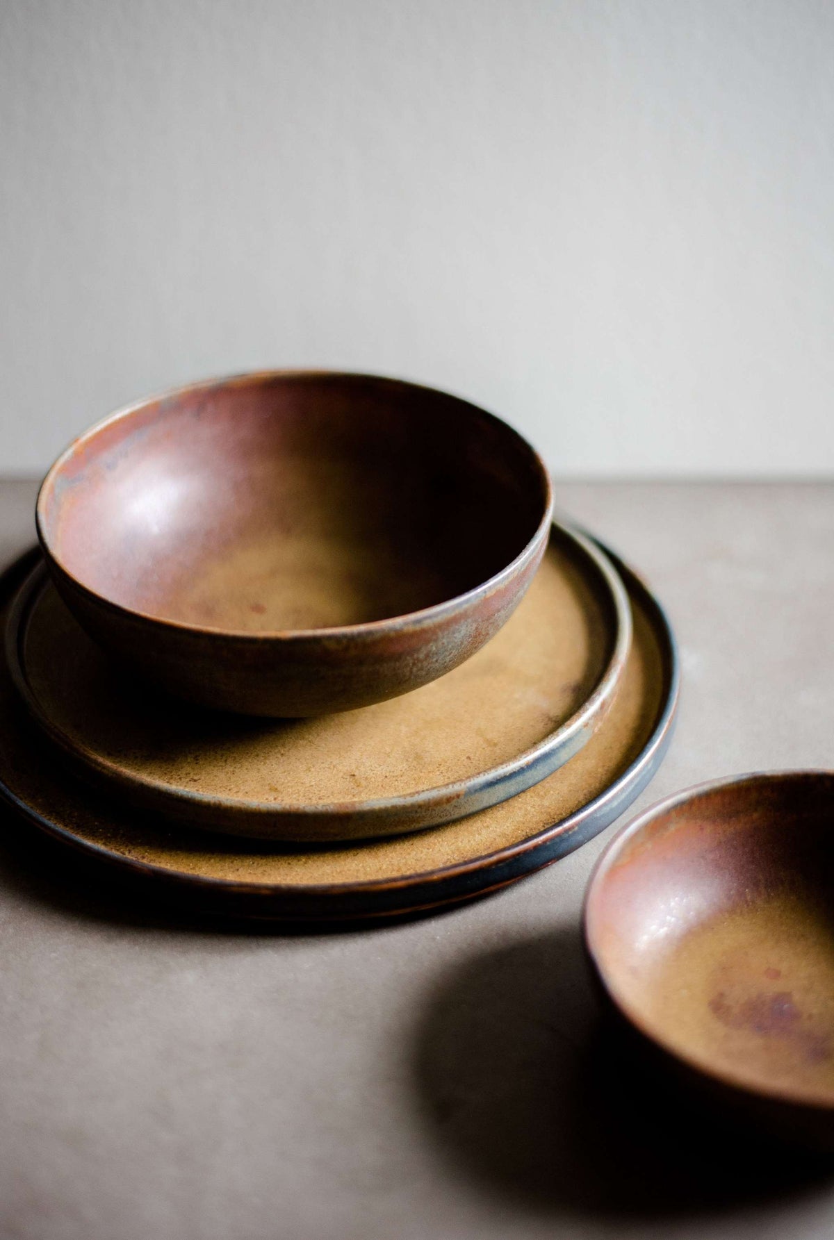 Rust Stoneware Mini Bowl hand-dipped matte brown-black ceramic with unique reactive glaze, handmade in Ukraine
