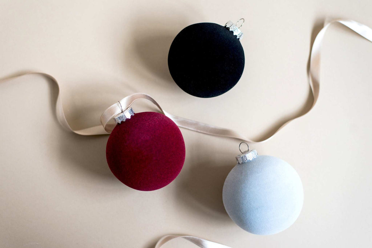 Porcelain velour Christmas ball ornament with silver cap and ribbon, handmade in Ukraine
