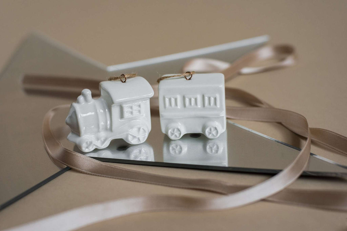 White handmade porcelain Christmas ornaments with jute loops for rustic holiday decor