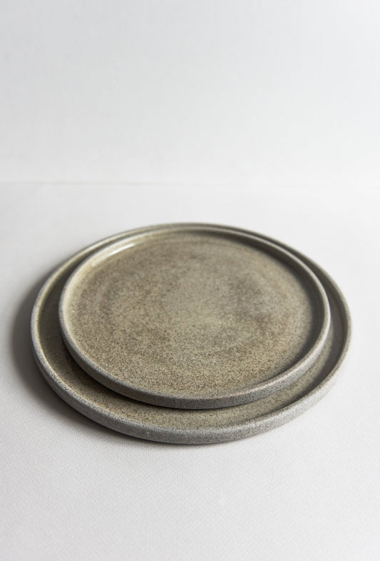 Stoneware dinner plates with concrete-like texture, handmade in Ukraine, glossy inside and rough outside, dishwasher and microwave safe