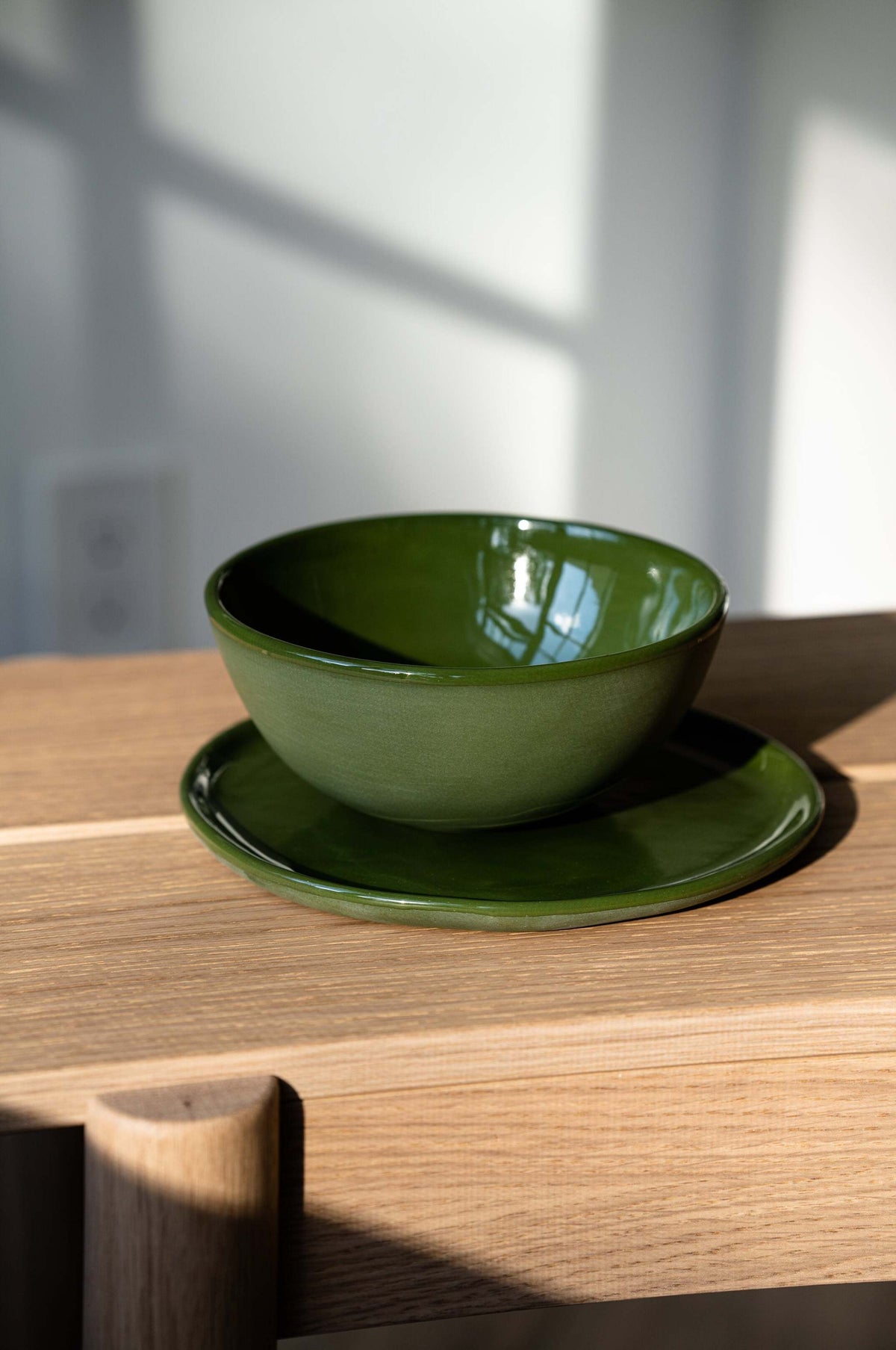 Handmade green porcelain dinner and salad plates set with shiny glaze and smooth finish