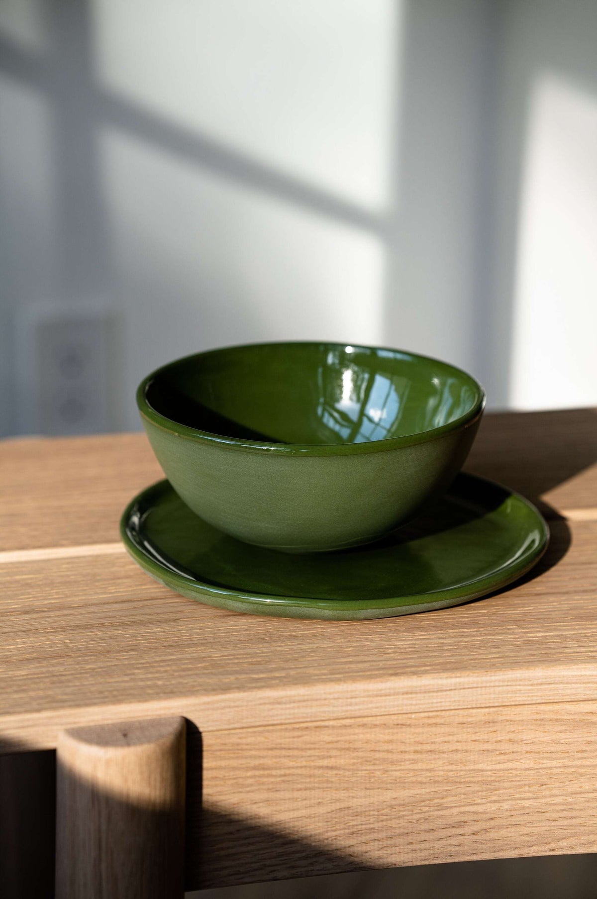 Handmade green porcelain bowl with shiny glaze, food-safe and lead-free, made in Ukraine