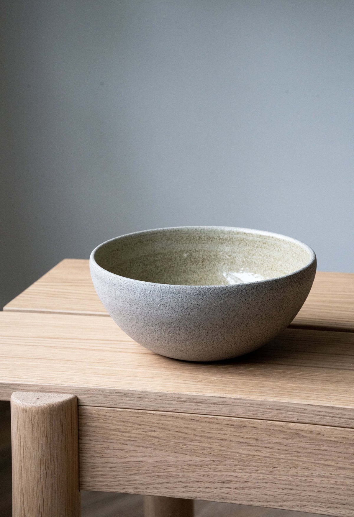 Handmade stoneware everyday bowl "Concrete" with polished rough exterior and glossy interior glaze