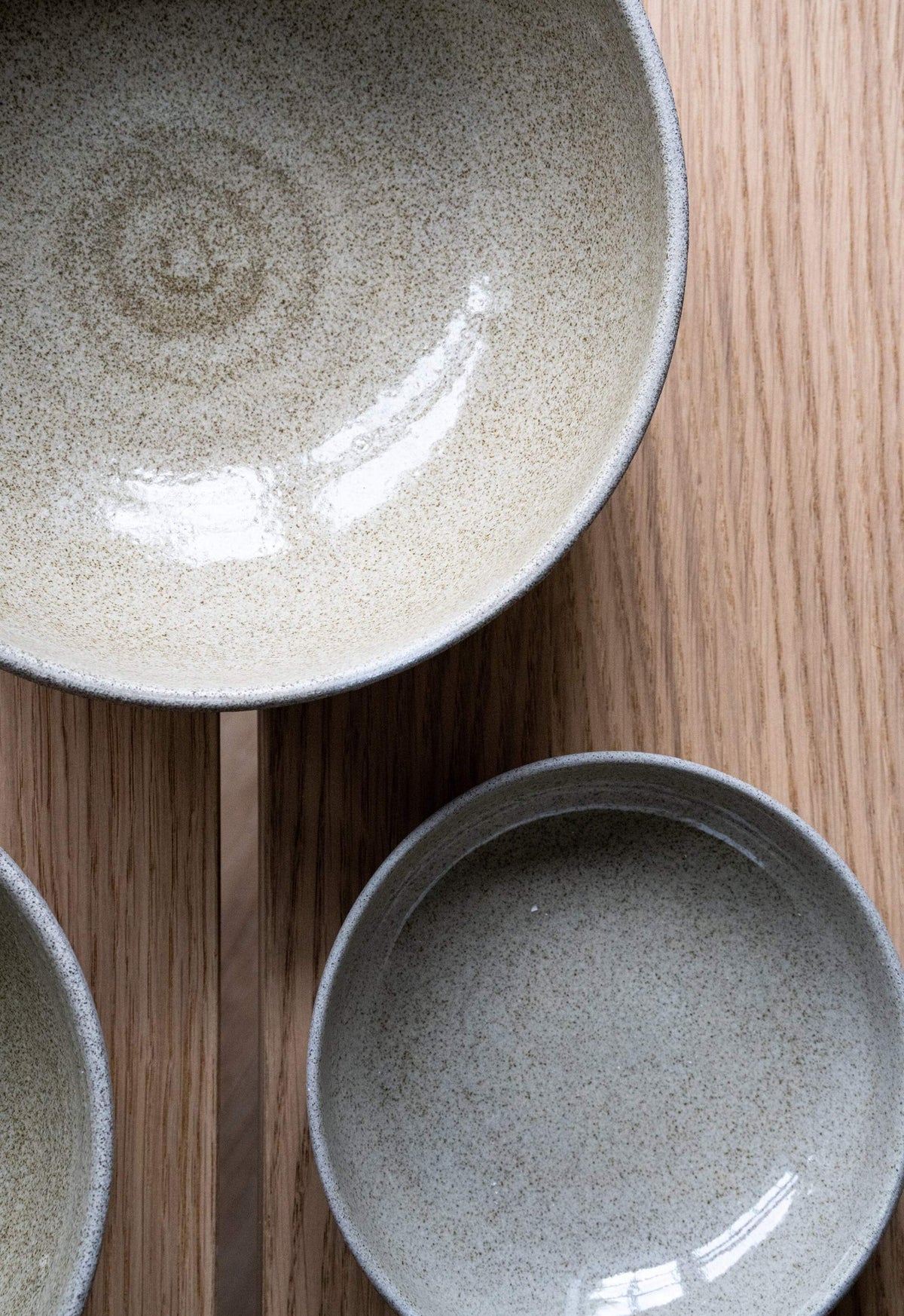 Handmade stoneware everyday bowl with concrete-like texture and glossy interior, dishwasher and microwave safe.