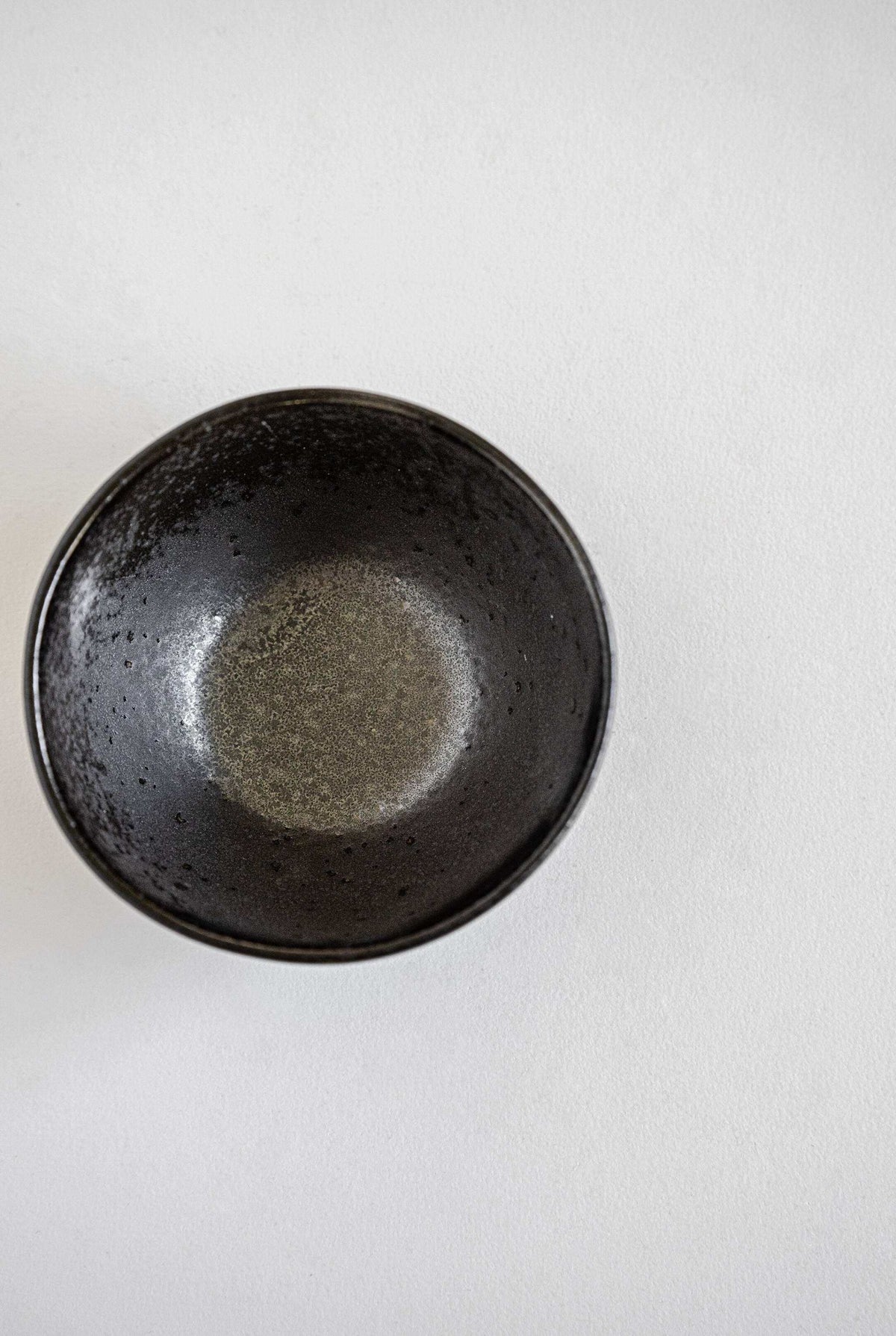 Black Stoneware Mini Bowl with matte black glaze and glossy speckles, handmade and food-safe stoneware