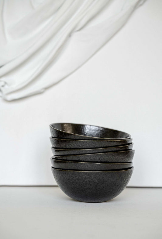 Matte black stoneware everyday bowl with glossy speckles, handmade and food-safe