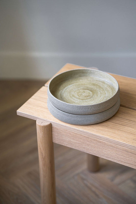 Handmade stoneware salad plate with high sides and concrete-inspired texture