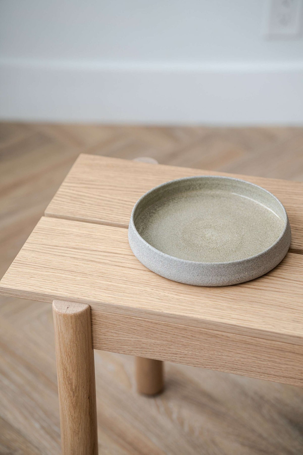 Handmade stoneware salad plate with high sides and concrete-inspired design