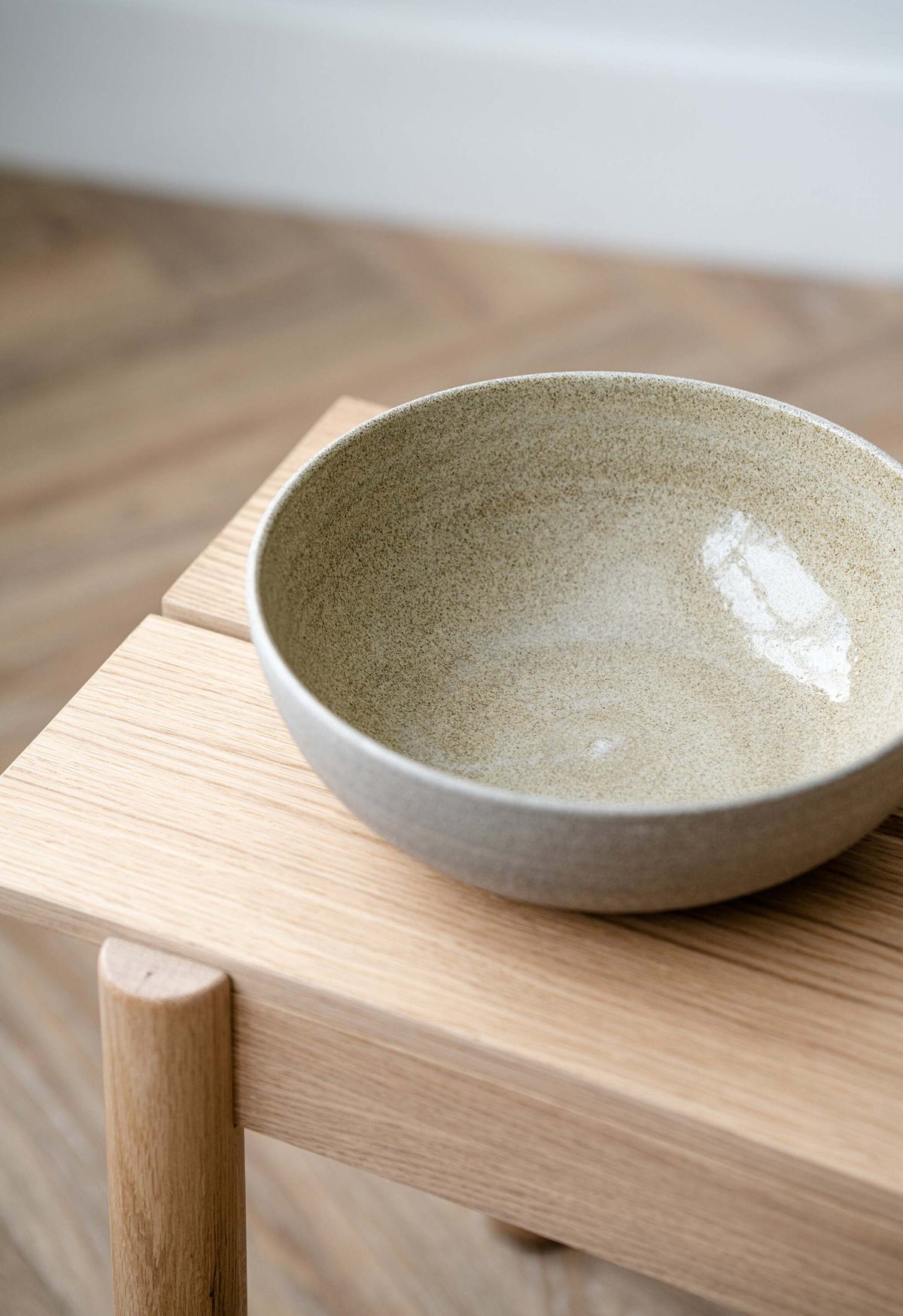 Stoneware large fruit bowl "Concrete" with polished exterior and glossy interior, handmade in Ukraine, filled with fresh fruits.