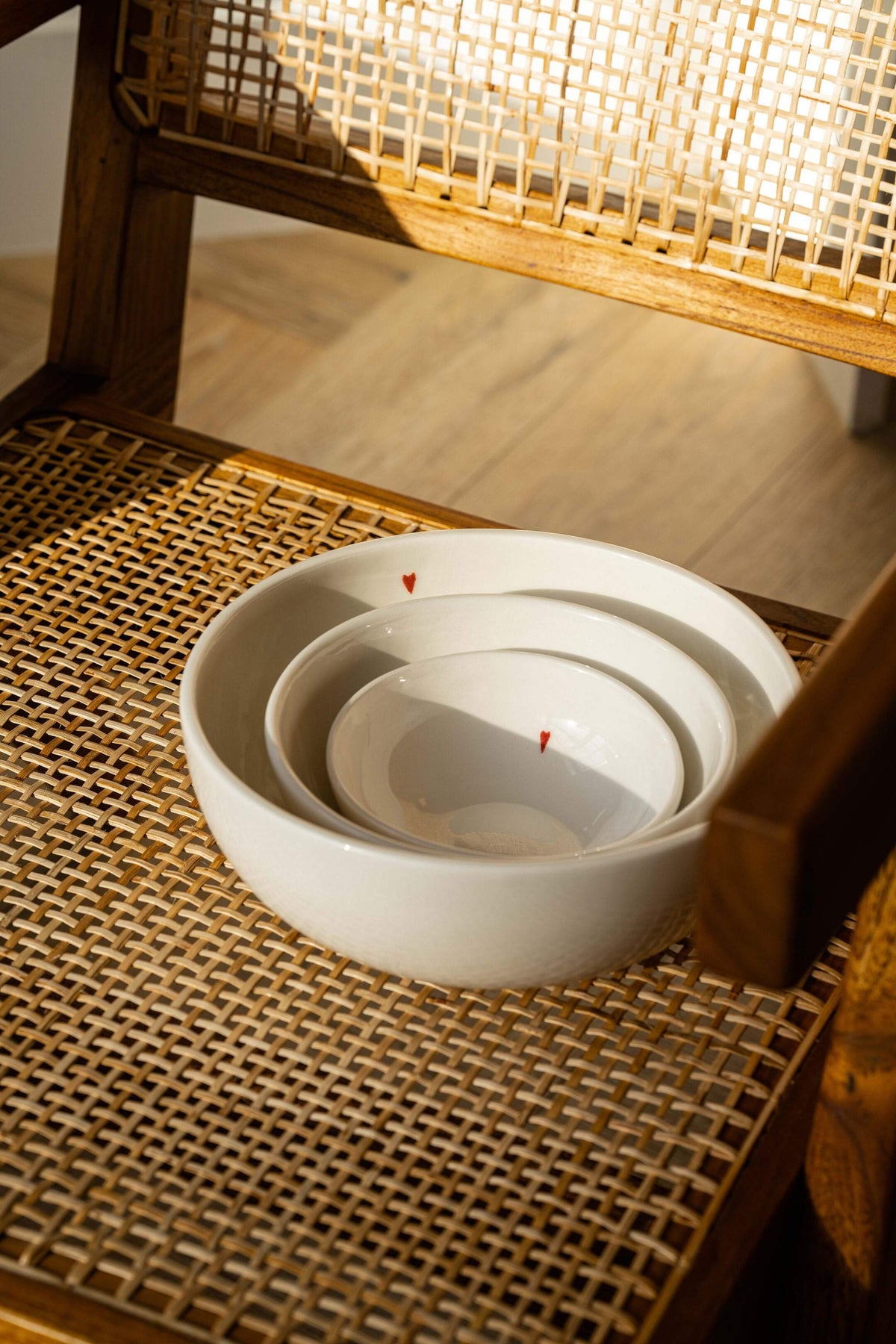 Off-white handmade porcelain bowl with red heart and "Thanks Love Happiness" text, glazed and food-safe