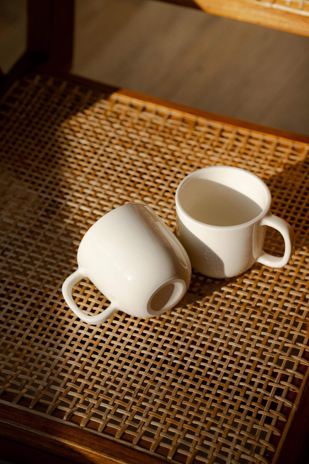 Handmade off-white porcelain coffee mug with glossy glaze, dishwasher and microwave safe, made in Ukraine