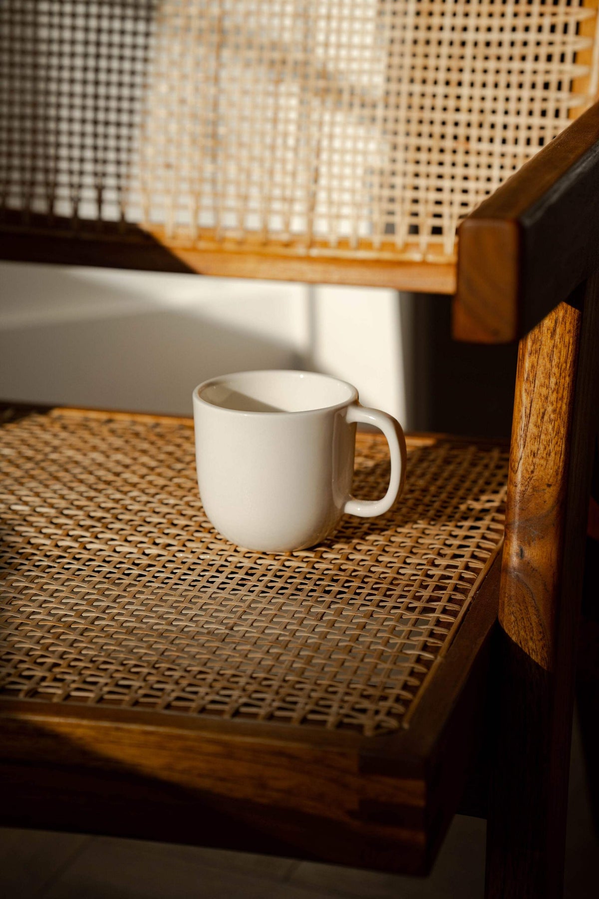 Handmade off-white porcelain coffee mug with glossy glaze, dishwasher and microwave safe, made in Ukraine