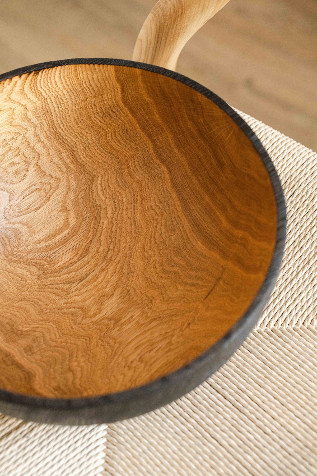 Hand carved large half charred wooden bowl made from oakwood with food-safe oil finish