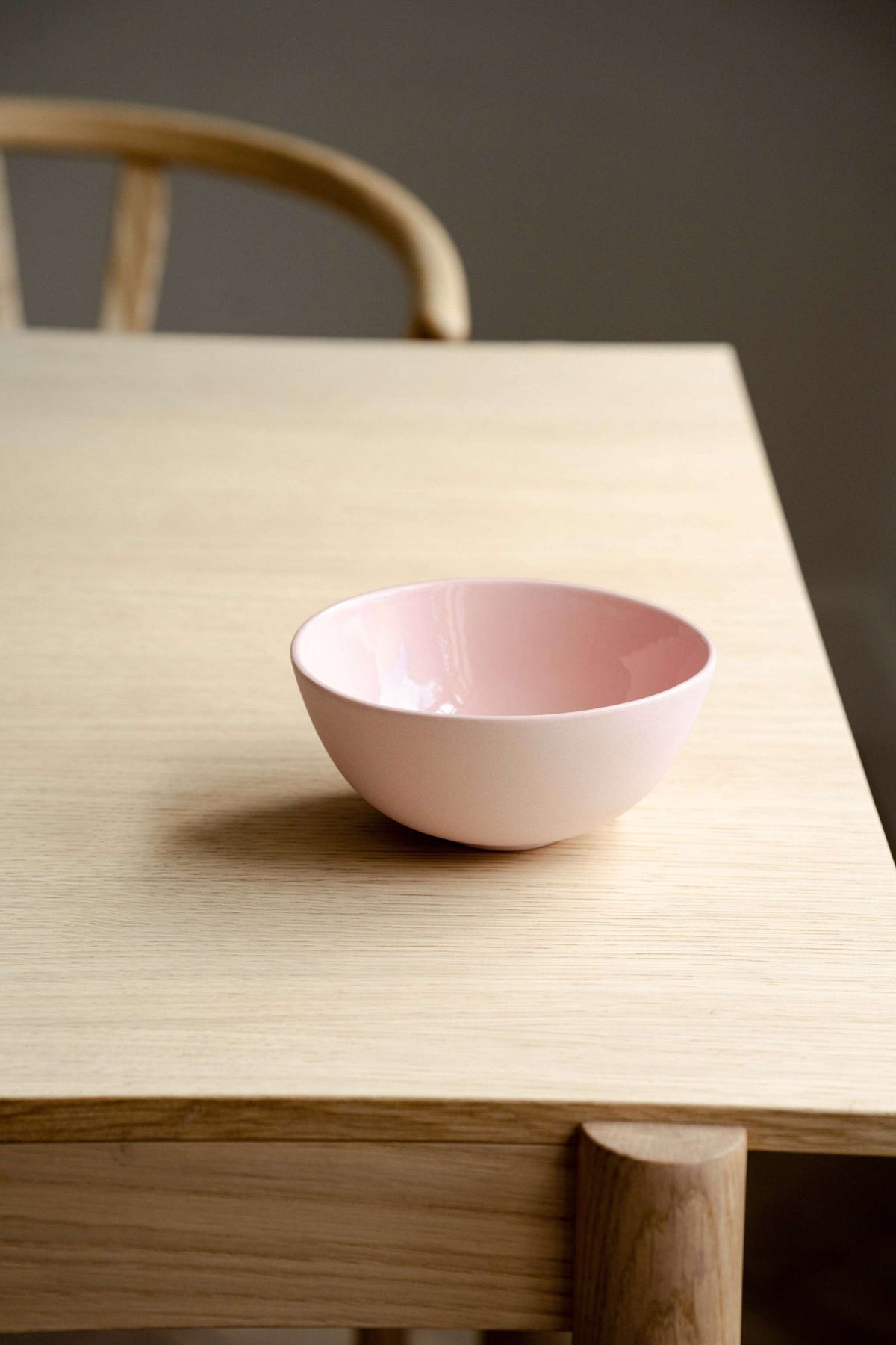 Handmade porcelain bowl powder pink with shiny glaze and smooth polished exterior