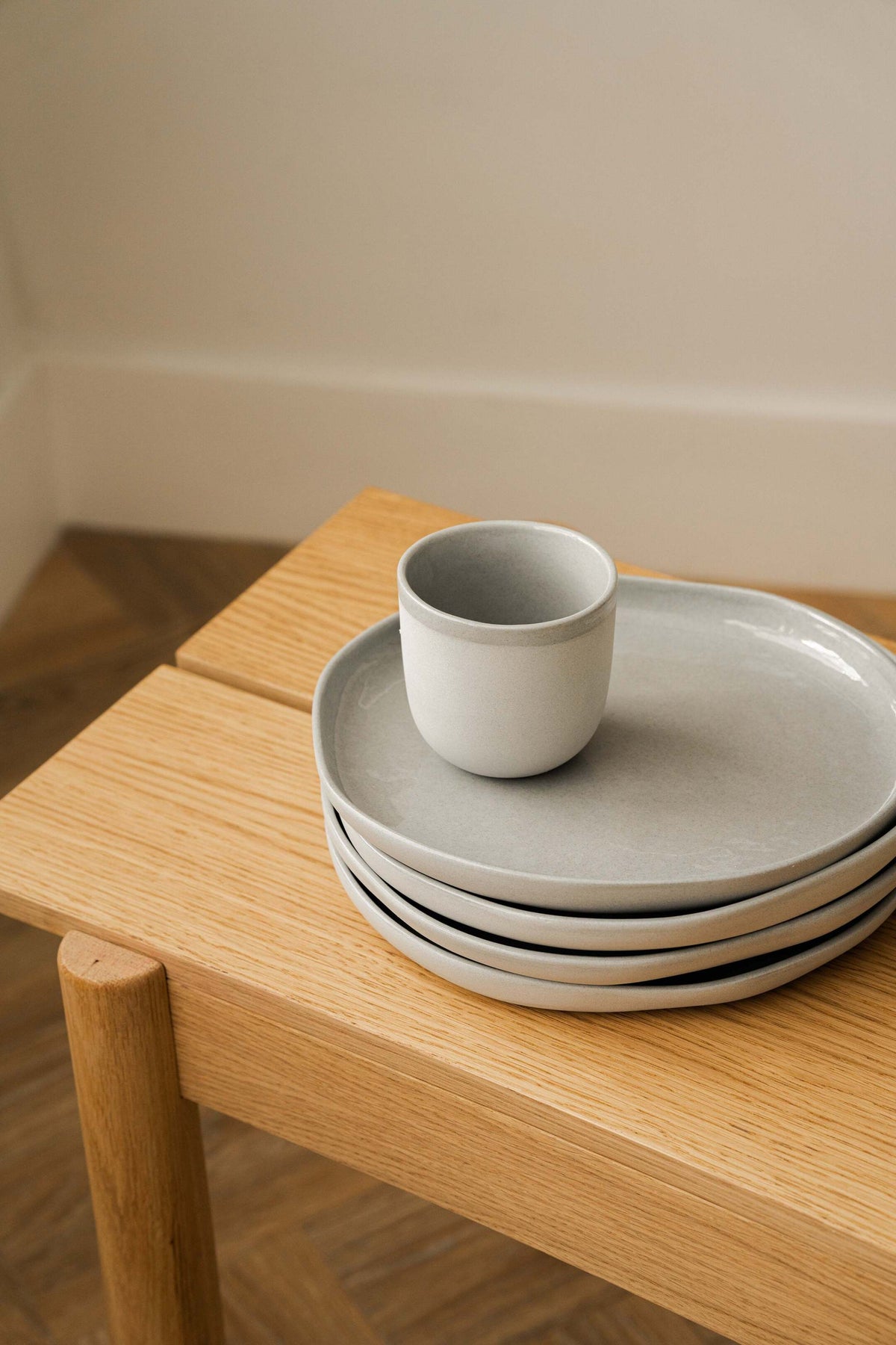 Handmade porcelain coffee cup in gray sky color with glossy glaze and smooth finish