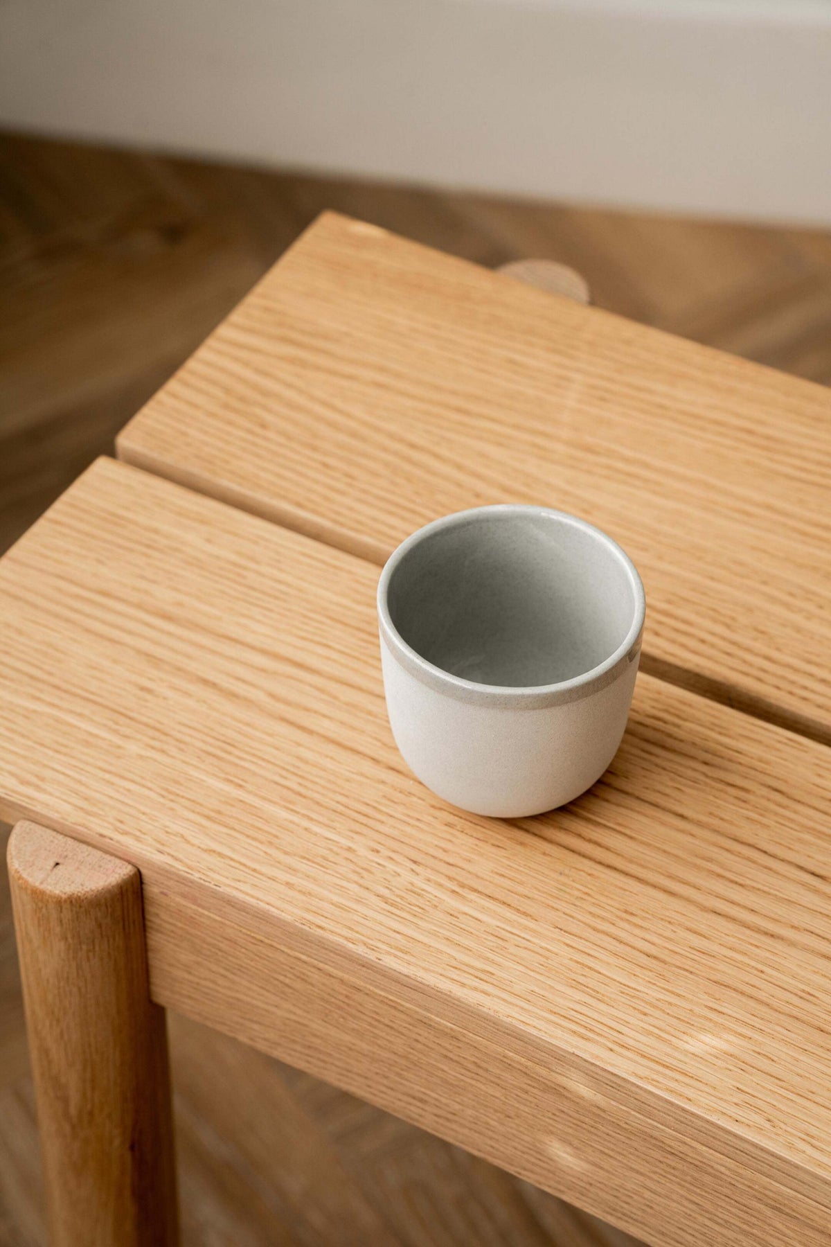 Handmade gray sky porcelain coffee cup with shiny glaze, polished exterior, dishwasher and microwave safe, 11-12 fl. oz.