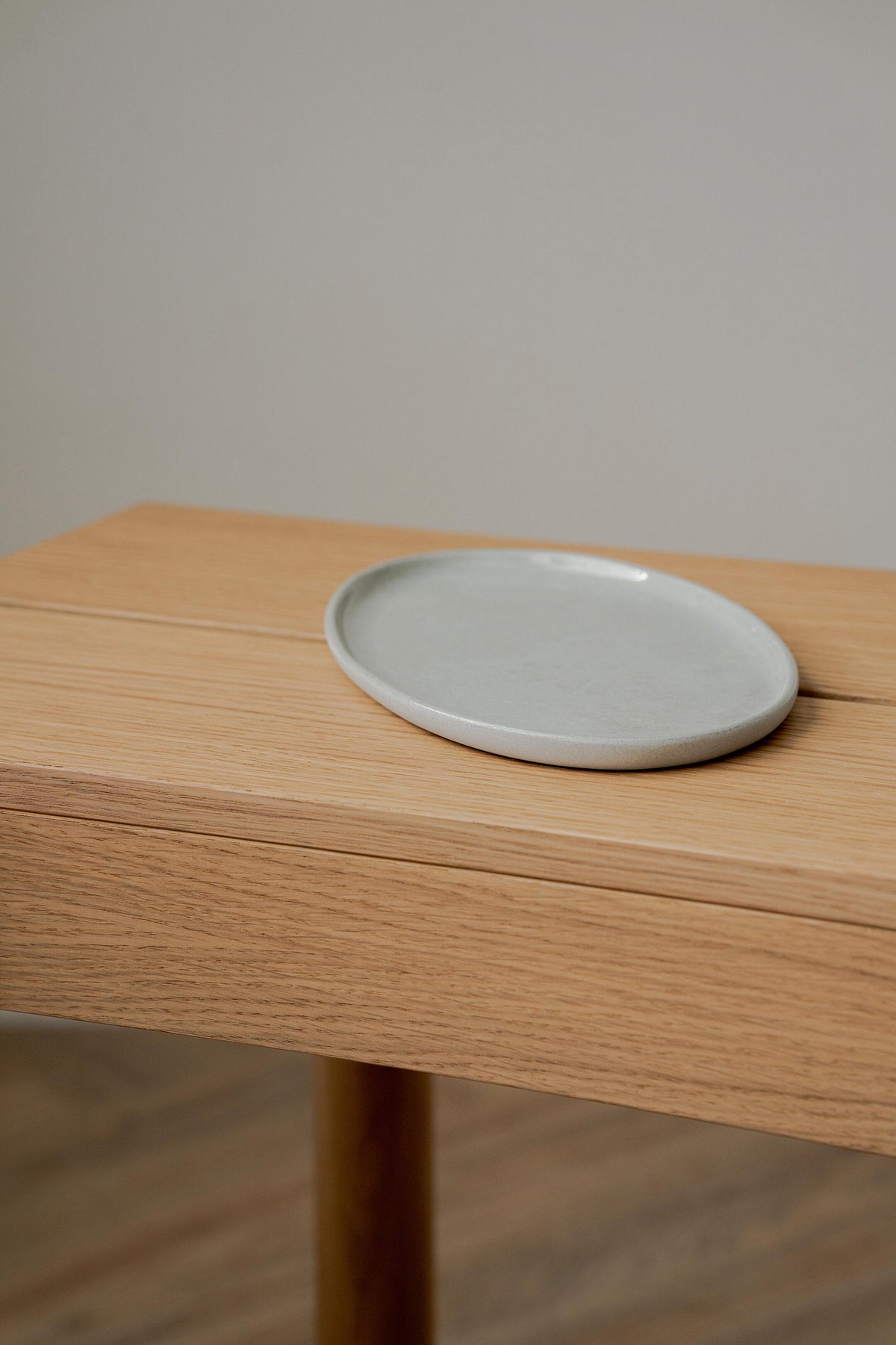 Handmade porcelain gray oval serving platter with organic edges, dishwasher safe
