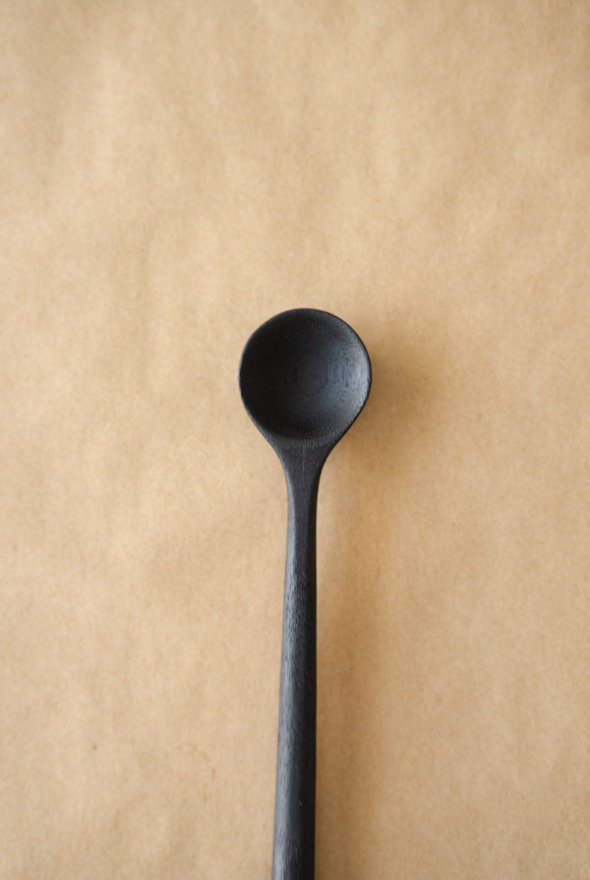 HandCarved charred walnut coffee spoon measuring coffee beans with elegant burnt finish