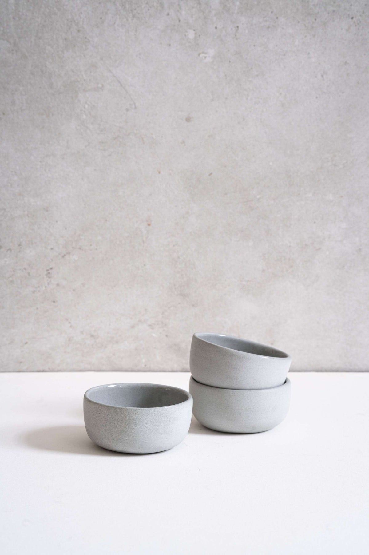 Handmade gray porcelain pinch bowl for condiments, food-safe and dishwasher-safe, unique design from Ukraine studio
