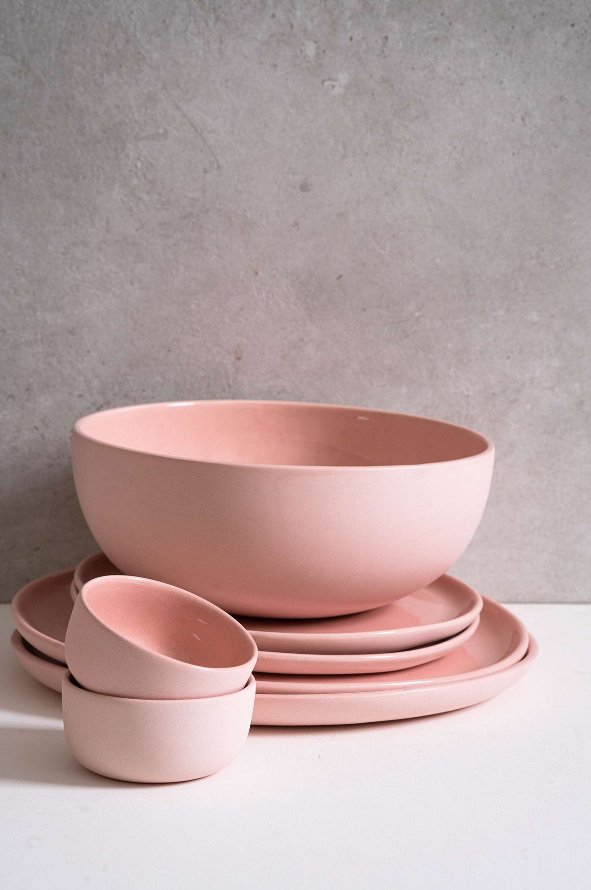 Handmade porcelain dinner plates in powder pink with shiny glazed interior and smooth polished exterior, set of dinner and salad plates, made in Ukraine