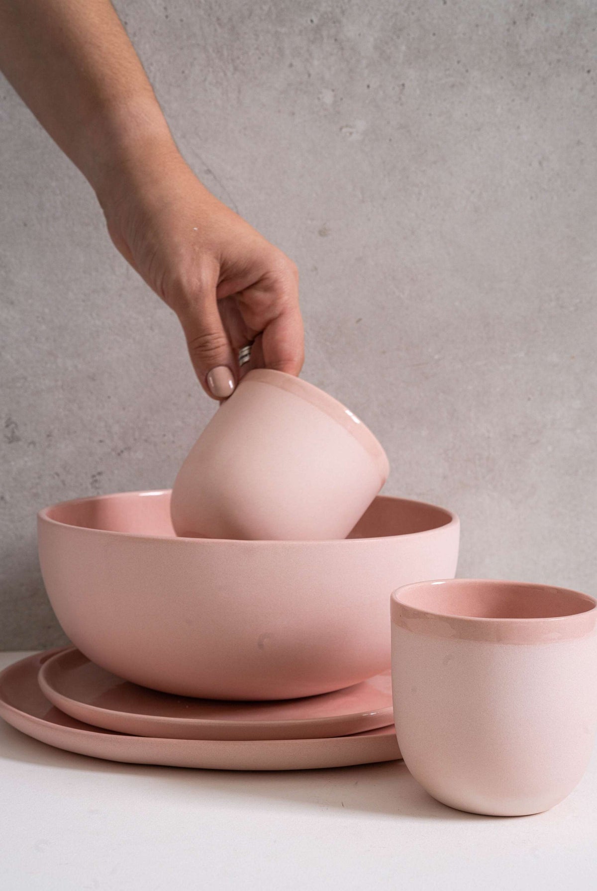 Handmade powder pink porcelain coffee cup with shiny glaze, smooth exterior, food-safe, dishwasher and microwave safe, made in Ukraine