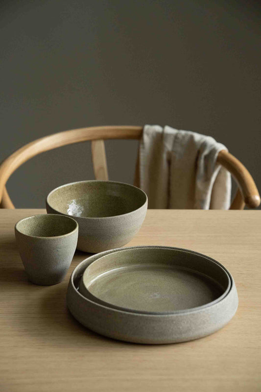 Handmade stoneware dinner set with matte exterior and glossy interior from Concrete Collection