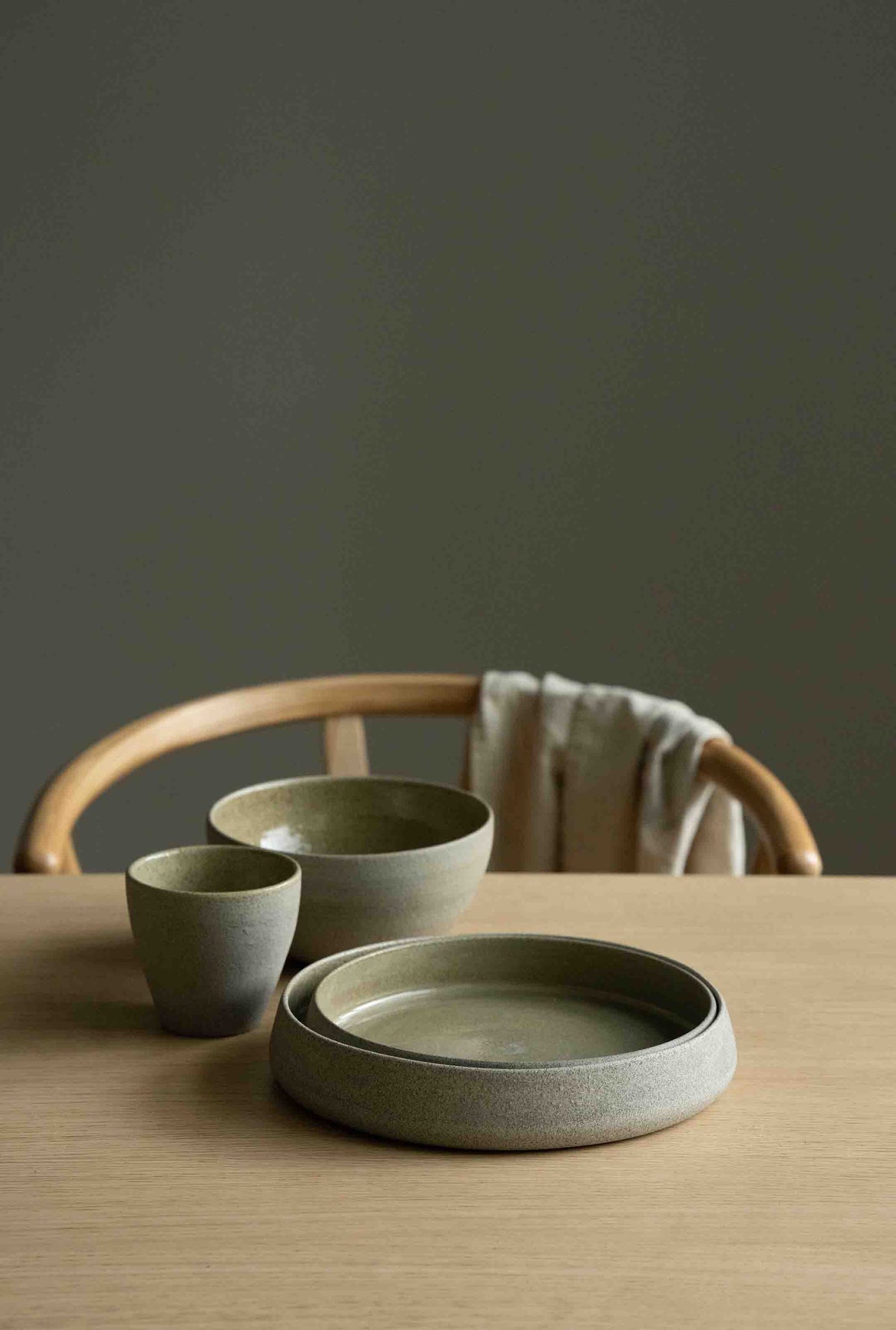 Handmade Concrete Stoneware Dinner Set with plate, bowl, and coffee cup, matte exterior and glossy interior