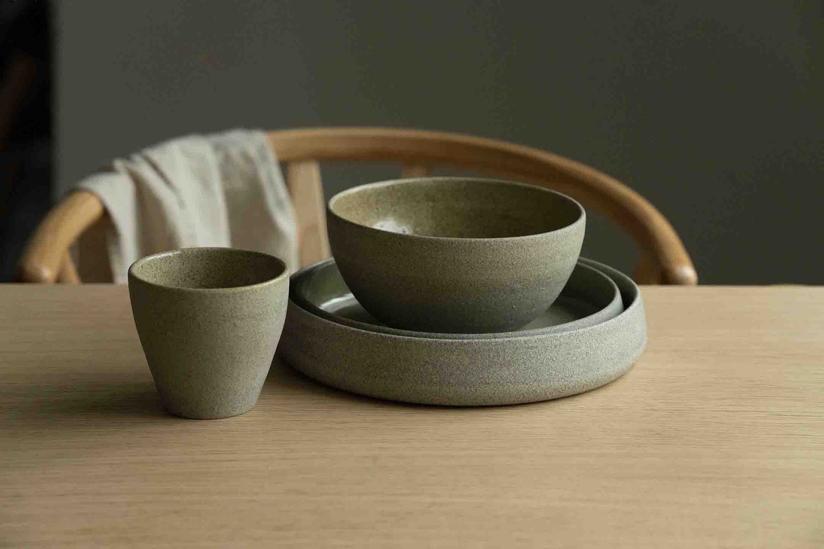 Handmade Concrete stoneware dinner set with matte exterior and glossy interior including plate, bowl, and coffee cup