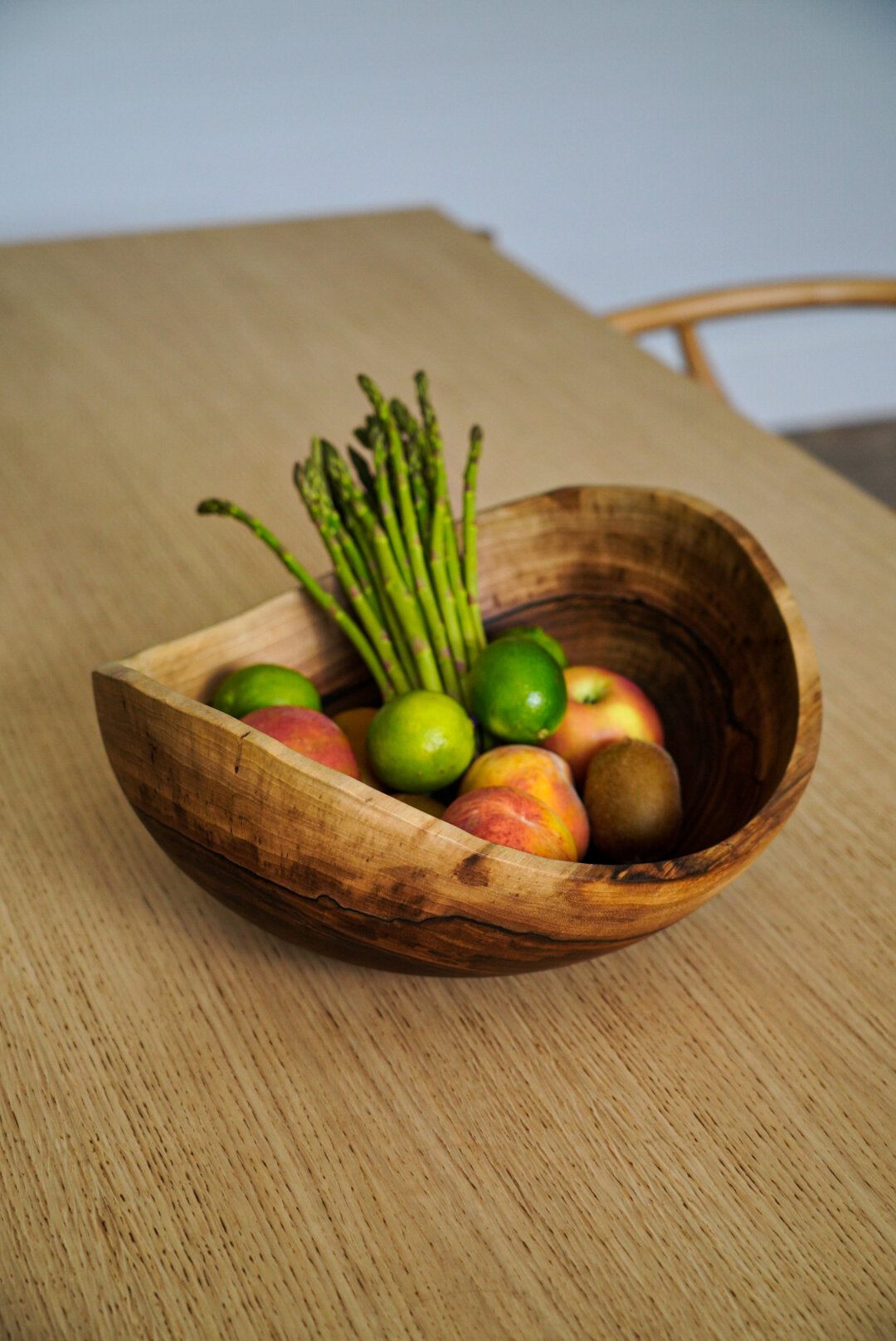 Hand carved extra large walnut wooden bowl with natural wood grain and oil finish