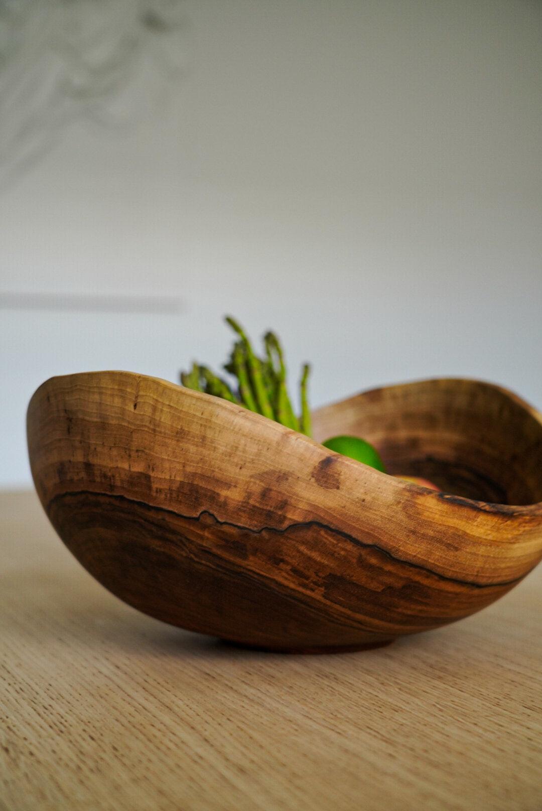 Hand carved extra large walnut wooden bowl with natural wood rings and oil finish