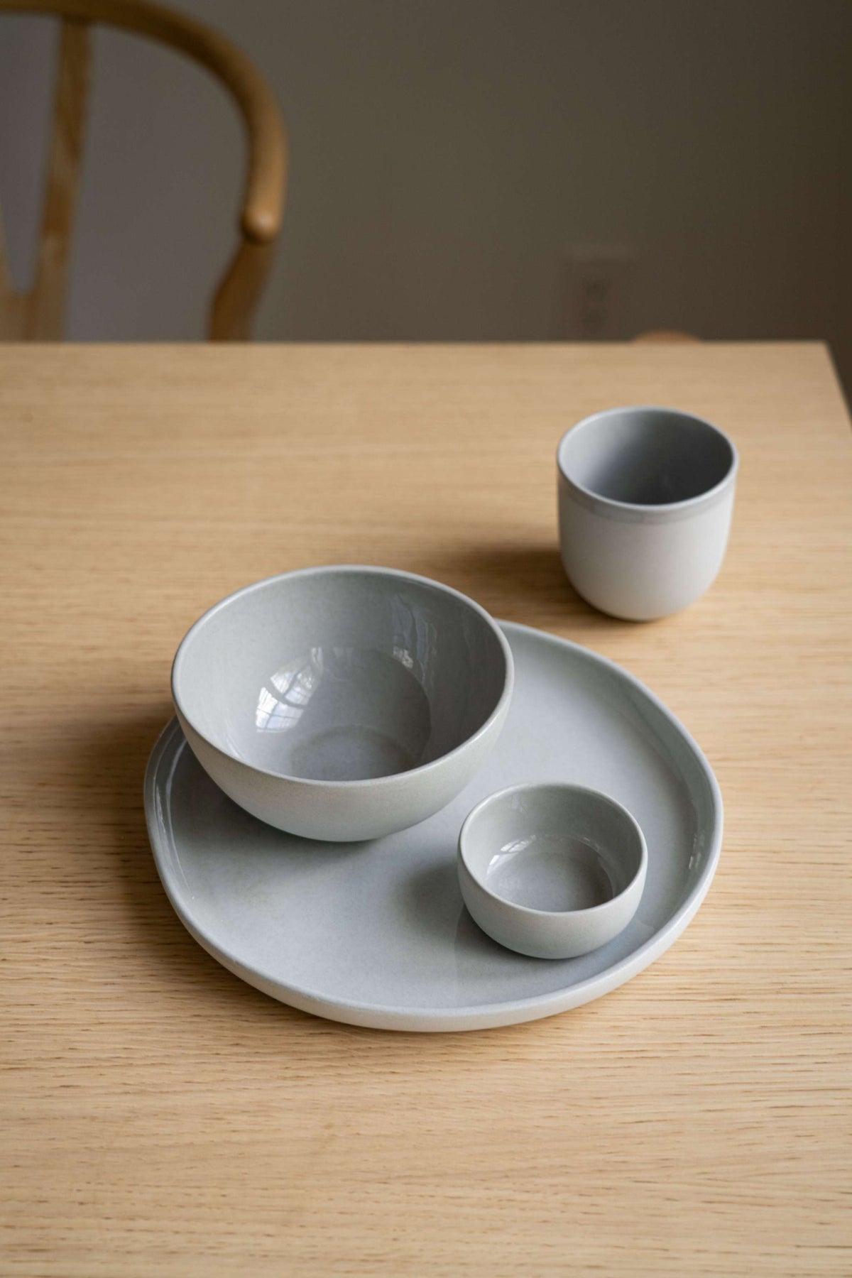 Handmade gray porcelain pinch bowl for sauces and condiments, food-safe and dishwasher-safe.