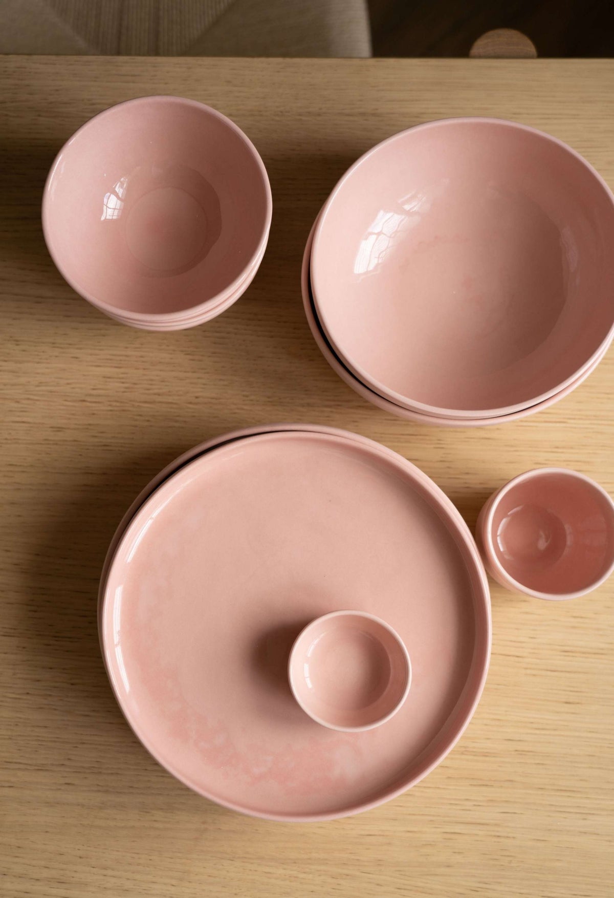 Handmade porcelain bowl in powder pink with glossy interior and smooth exterior, dishwasher and microwave safe, made in Ukraine