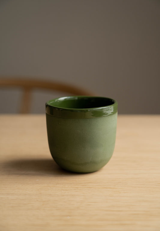 Handmade porcelain coffee cup green with shiny food-safe glaze, smooth polished exterior, dishwasher and microwave safe, made in Ukraine
