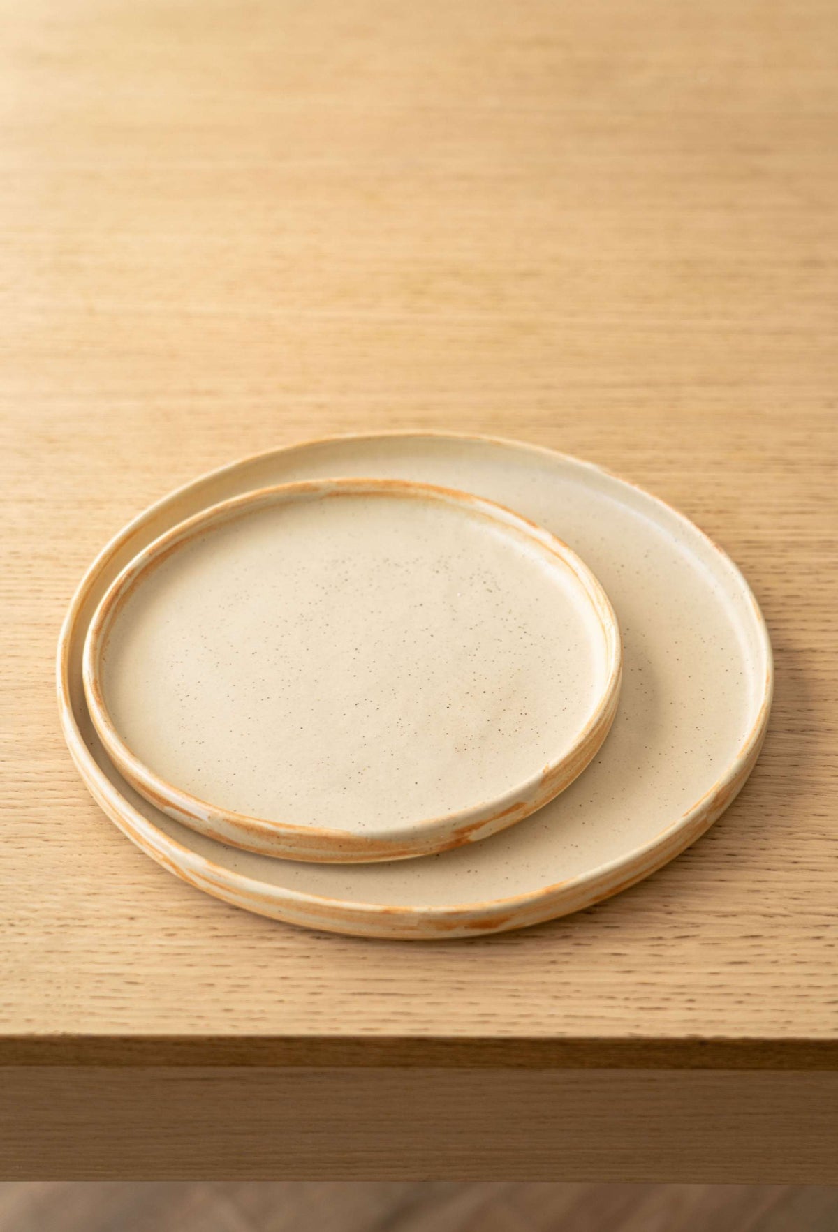 Beige matte stoneware dinner plates with unique reactive glaze, handmade in Ukraine, dishwasher and microwave safe