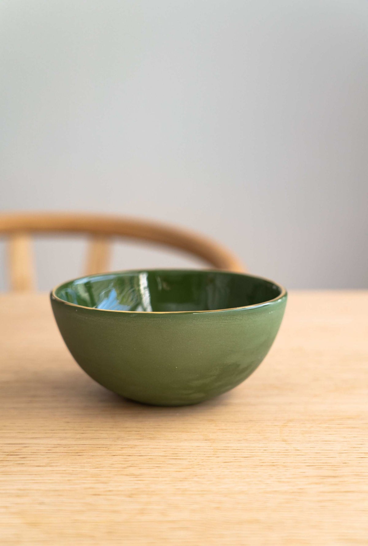 Handmade green porcelain bowl with gold rim, polished finish, food-safe and dishwasher safe, made in Ukraine