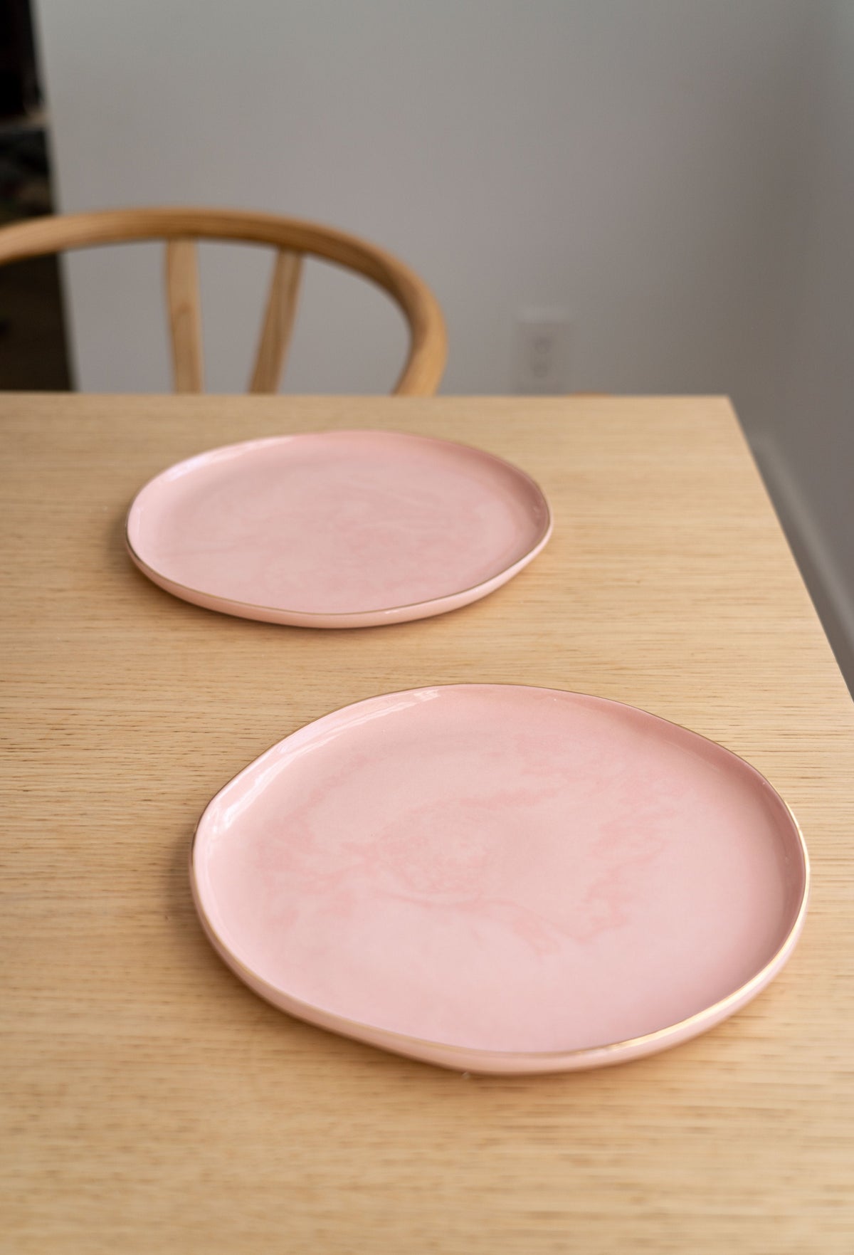 Handmade porcelain dinner plate in powder pink with gold rim