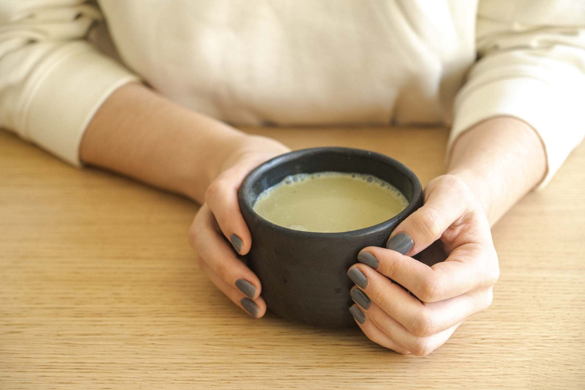 Minimalist stoneware black matcha bowl with sharp vertical sides, handmade in Ukraine, dishwasher and microwave safe