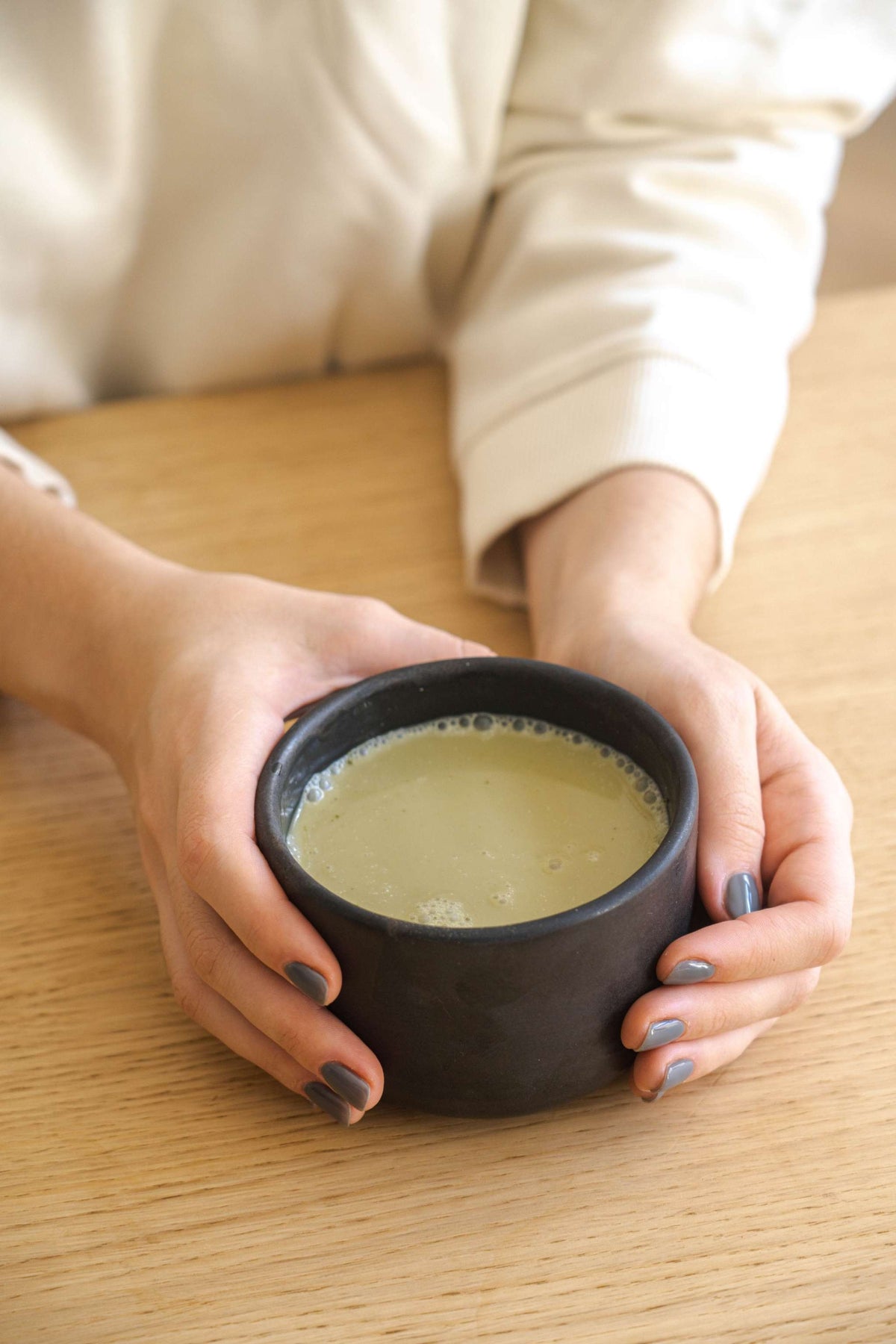 Stoneware black matcha bowl with sharp vertical sides for proper whisking, handmade in Ukraine, food-safe, dishwasher and microwave safe.