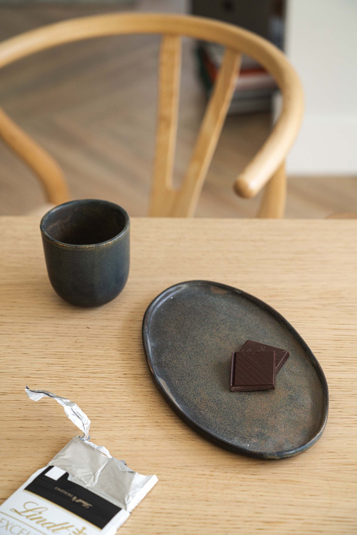 Rust matte stoneware serving platter with oval shape and organic edges, handmade in Ukraine with food-safe glaze