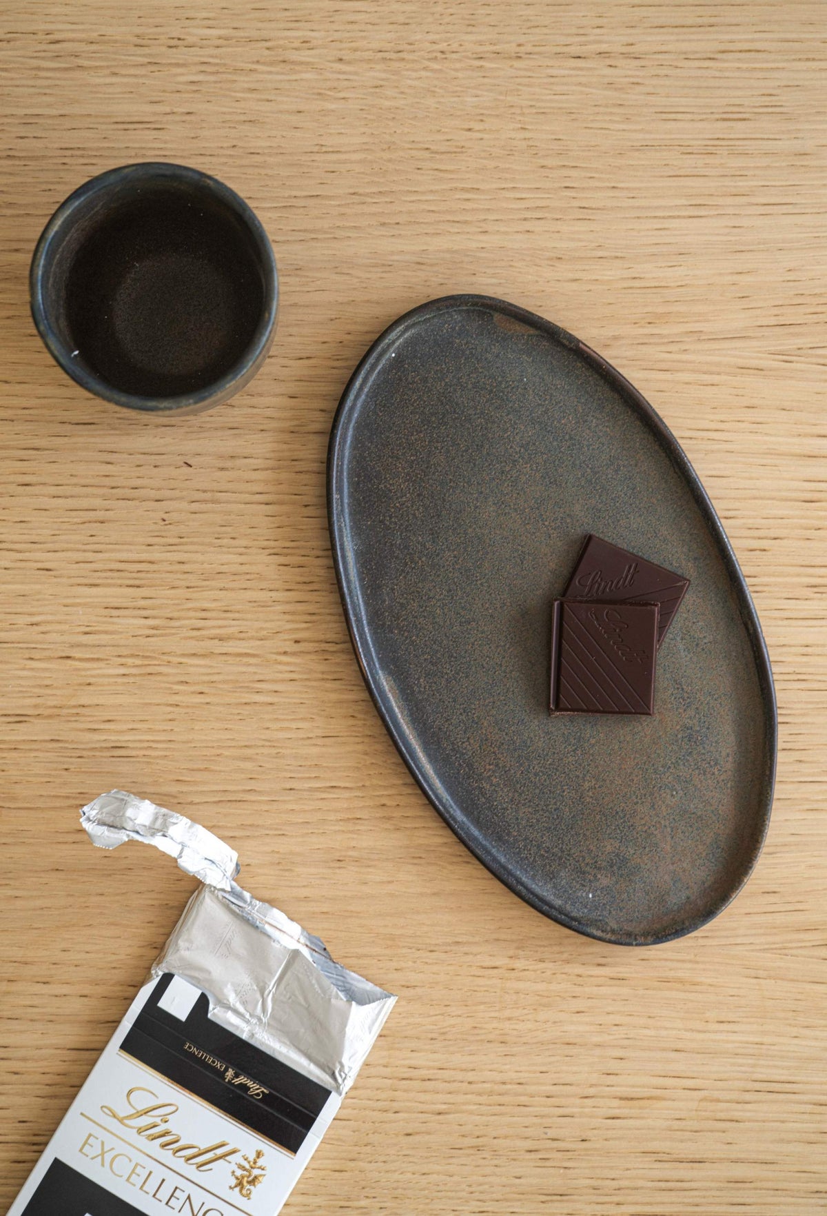 Rust matte stoneware serving platter with organic round edges and reactive glaze, handmade in Ukraine
