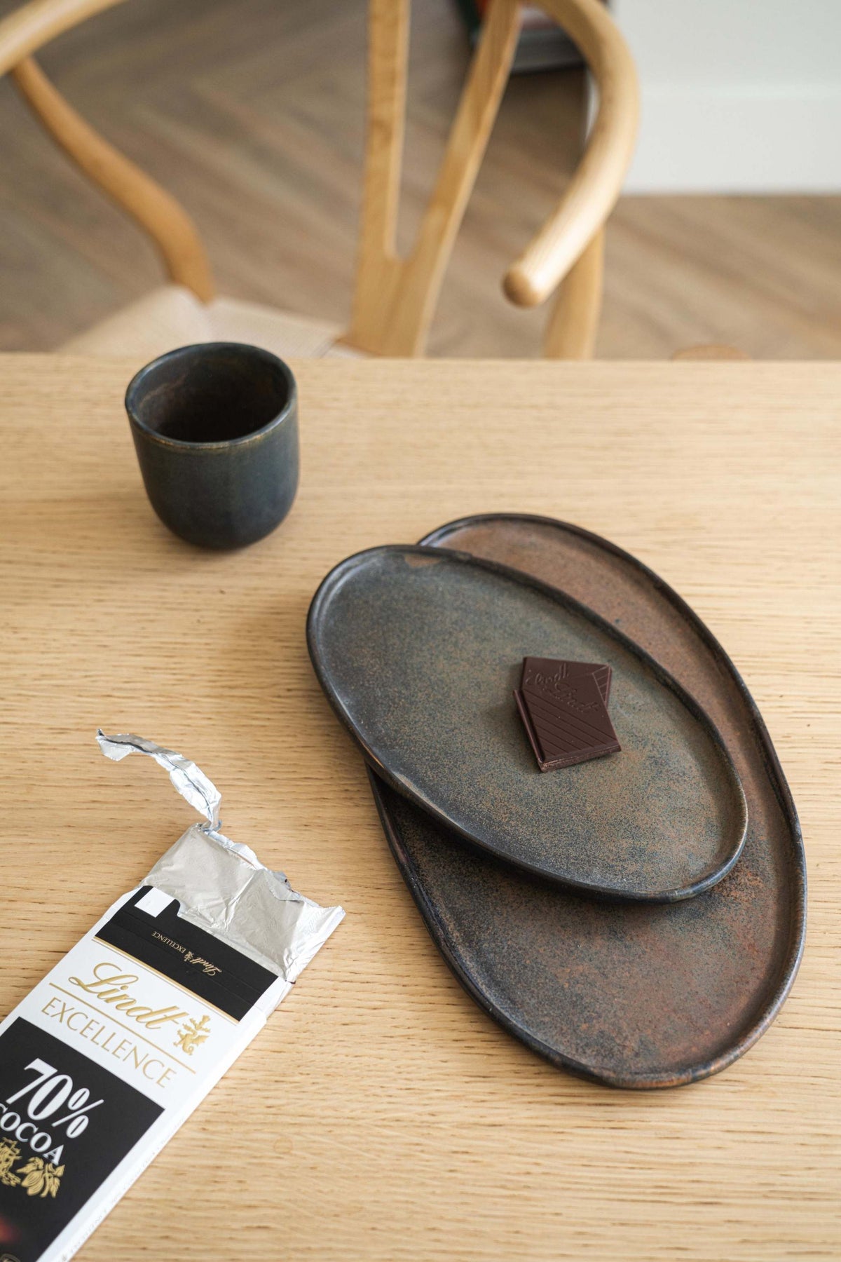 Rust matte stoneware serving platter with organic oval shape and reactive glaze, handmade in Ukraine